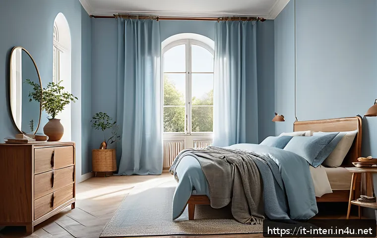 실내건축의 색채 계획과 심리학 - A serene bedroom interior painted in soothing light blue tones, featuring natural wooden furniture a...